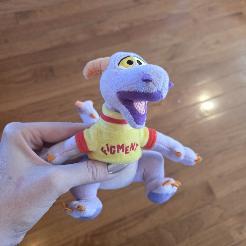 Purple and Yellow Stuffed Dragon Toy